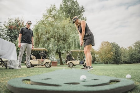 Woman playing golf Woman playing golf