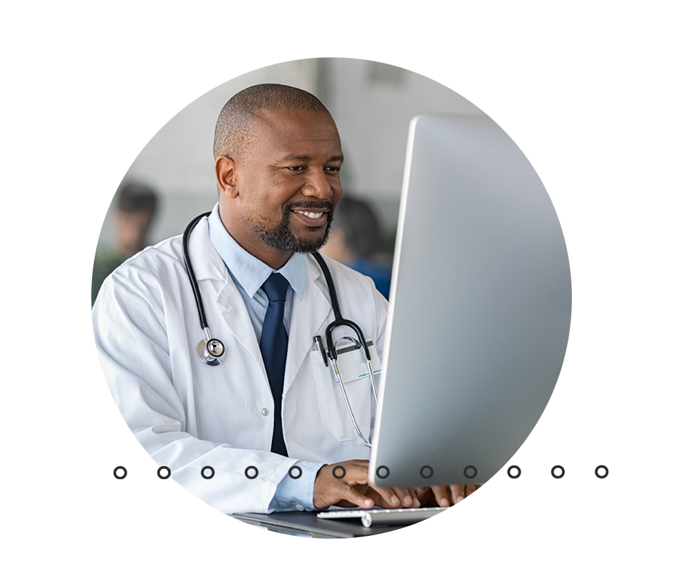 Male doctor using computer